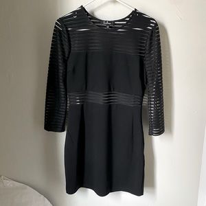 Black body con with cutout details. Really cute and flattering.